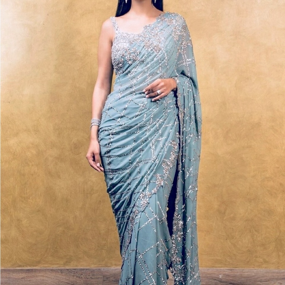 sky blue saree.